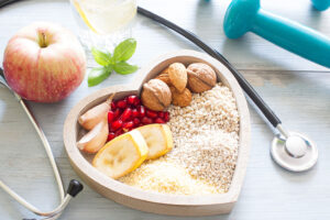 Healthy food in heart and water diet sport lifestyle concept